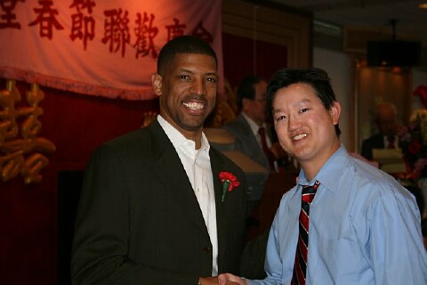 Dr. David
                    Yee with NBA All-Star Kevin Johnson